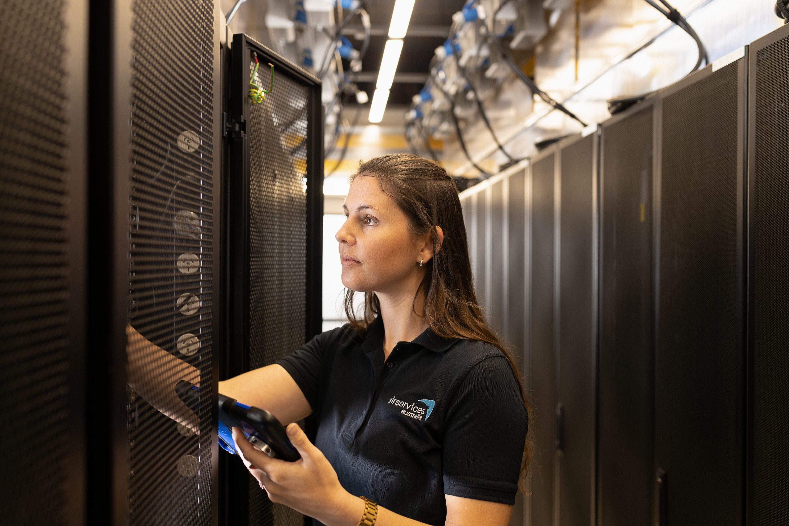 Airservices Australia team member in our OneSKY server rooms.