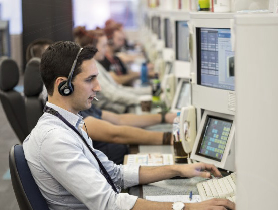 Enroute air traffic controllers in operations centre.