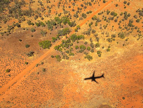 Aeroplane shadow on the ground.