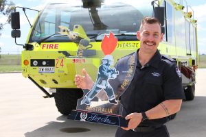 Townsville aviation rescue fire fighter Rhys Siganto wins award.