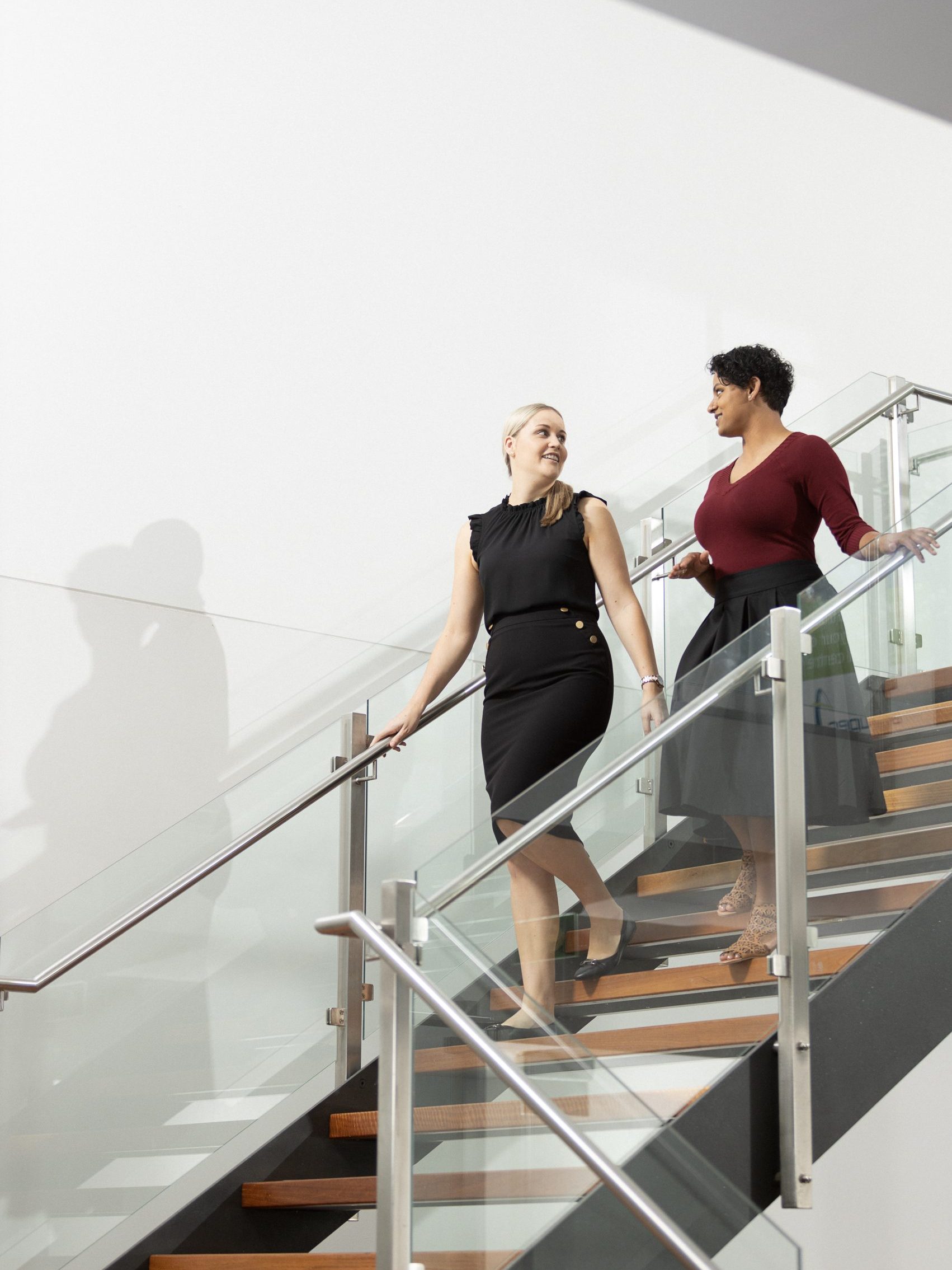 Airservices employees walking down the stairs