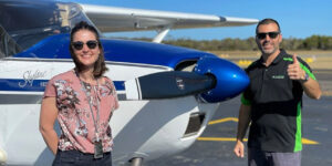 Candice Pearson with flight training instructor