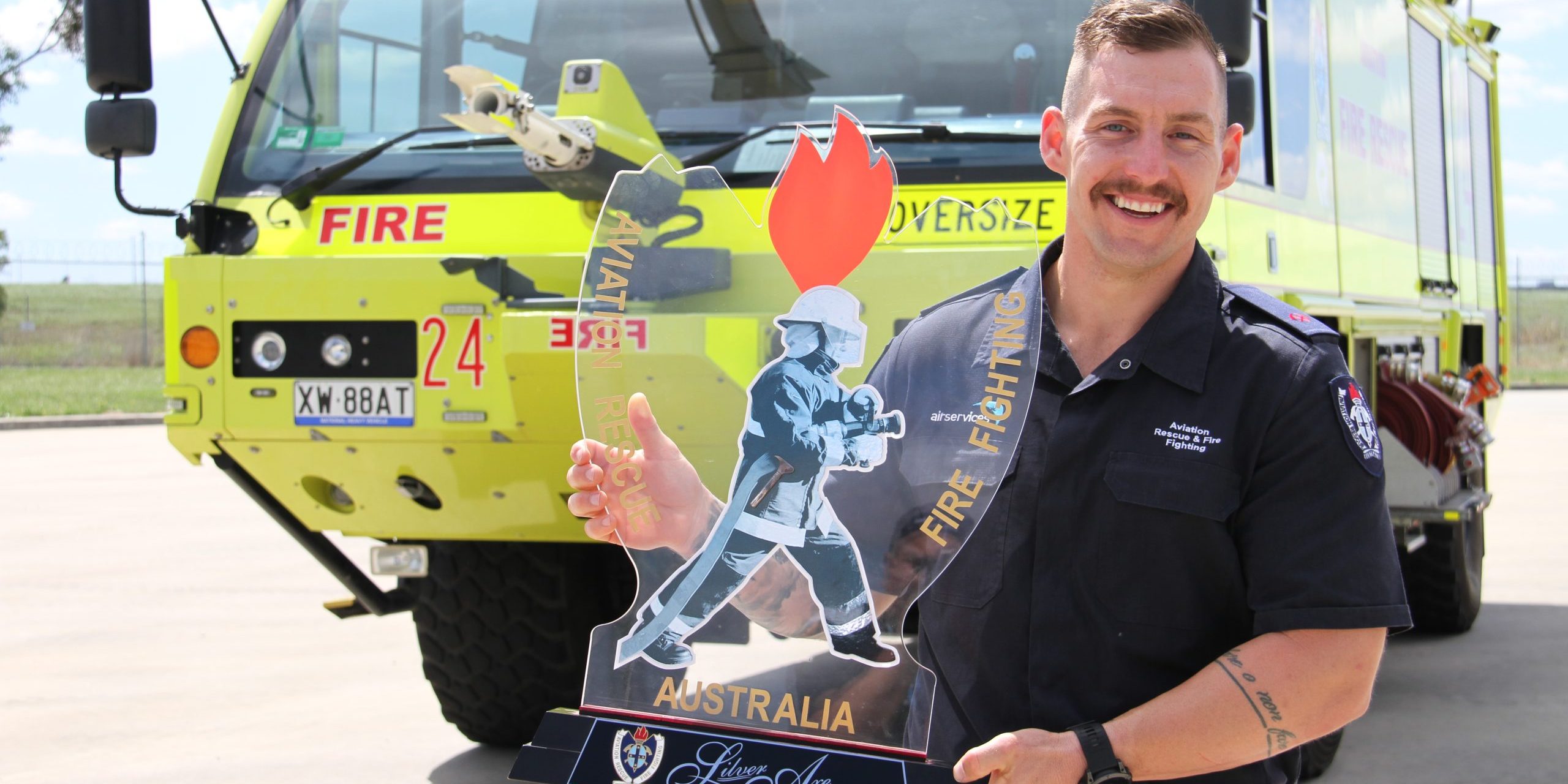 Townsville aviation rescue fire fighter Rhys Siganto wins award.