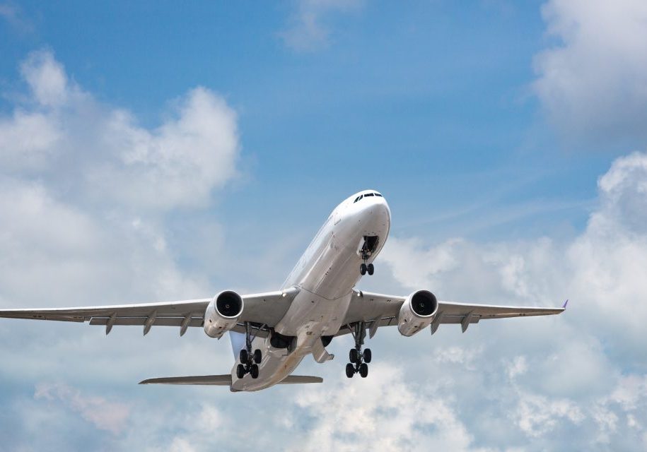 passenger-airplane-taking-off-in-bright-cloudy-sky-2023-11-27-05-16-44-utc