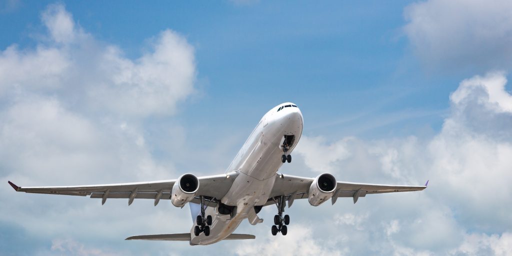 passenger-airplane-taking-off-in-bright-cloudy-sky-2023-11-27-05-16-44-utc