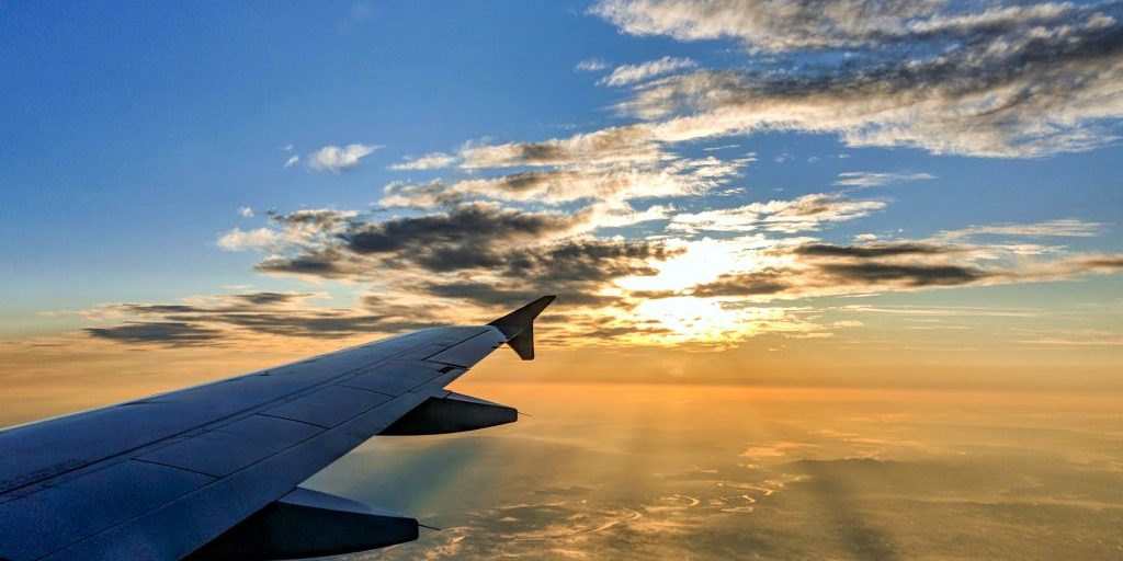view-from-airplane-window-beautiful-sunset-sky
