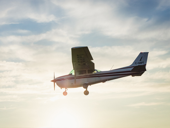Recreational aircraft flying in the sky.