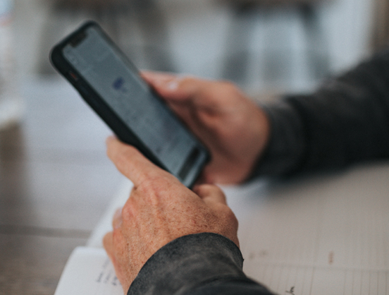 Person checking mobile phone